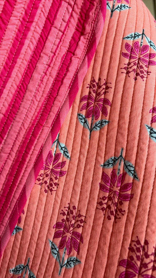 FLOR Y RAYA SALMON Y FUCSIA