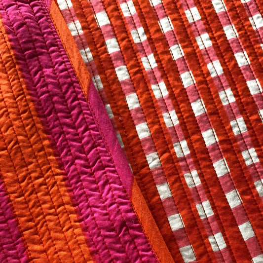 RAYA ANCHA NARANJA Y FUCSIA  CON CUADROS